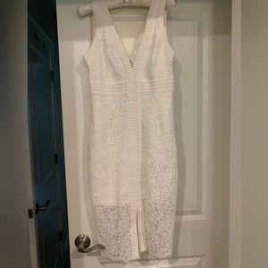 Bardot white lace halter dress. It is brand new and unaltered.